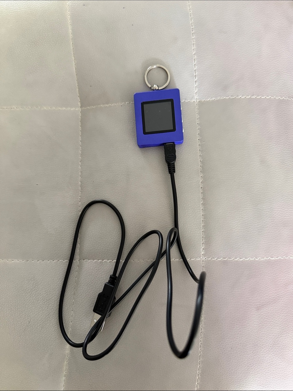 Sharper Image Purple MP3 Keychain Player with Black USB Cable